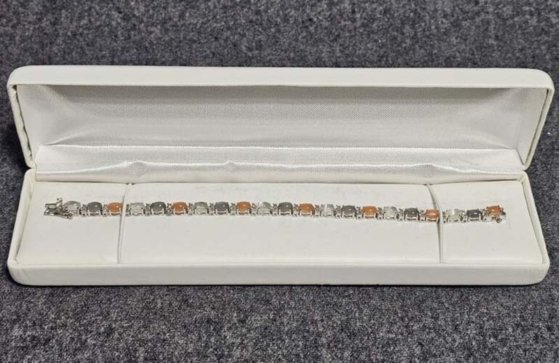 Whir, grey and orange silver bracelet