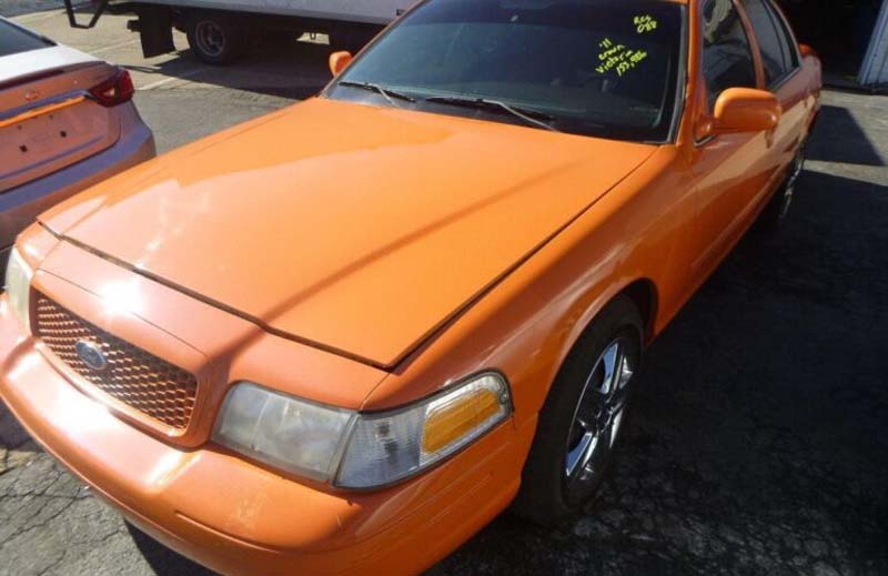 Orange Ford sedan