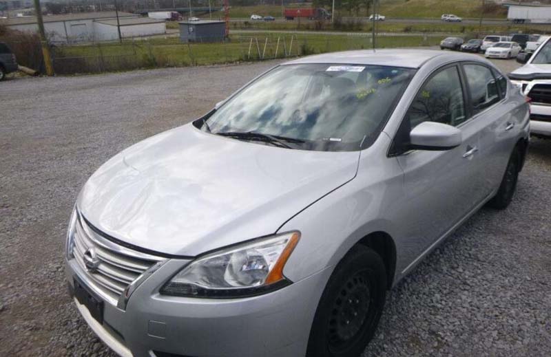 Nissan silver sedan