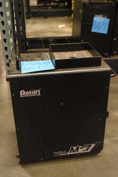 Black Antari M-7 RGBA fog machine with a blue label marked "675".
