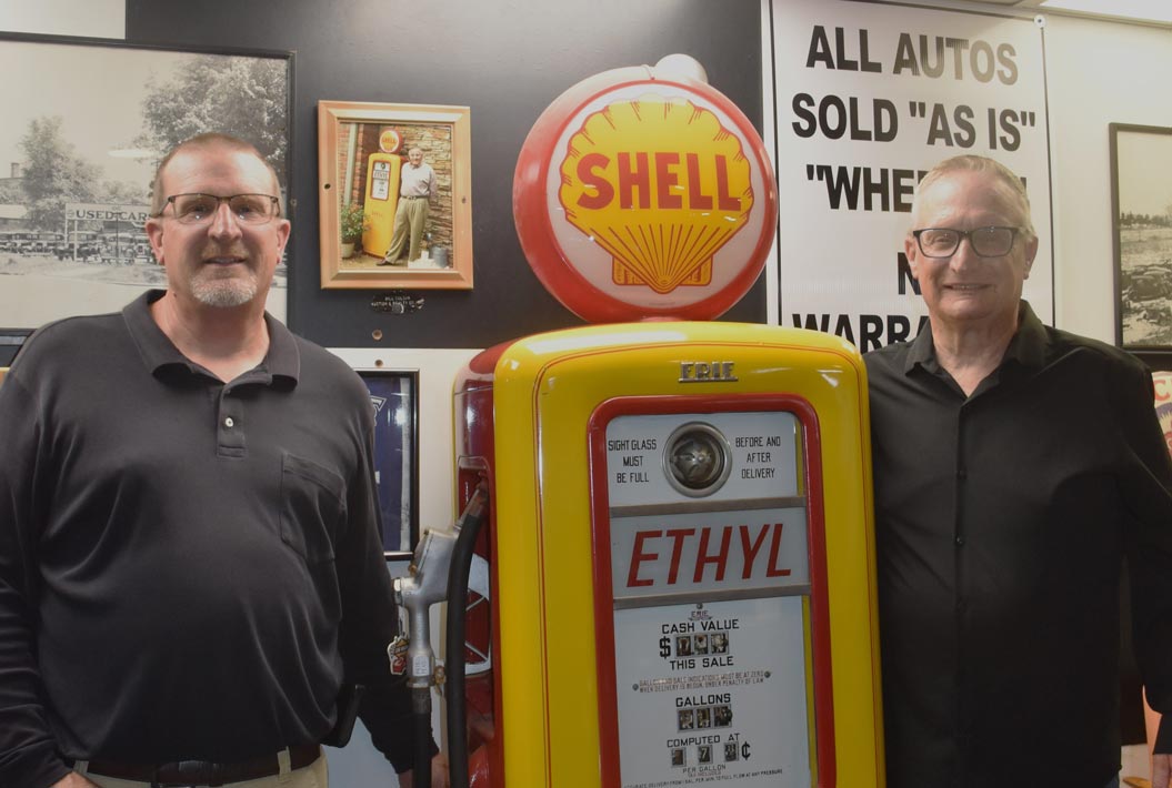Marc and Bobby next to gas pump